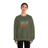 WATCHING WOMENS SPORTS UNISEX SWEATSHIRT